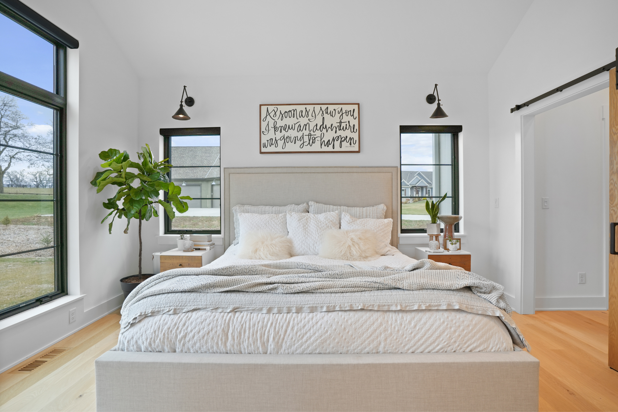 Bright and airy bedroom with large windows, designed by Residential Architects Wisconsin.