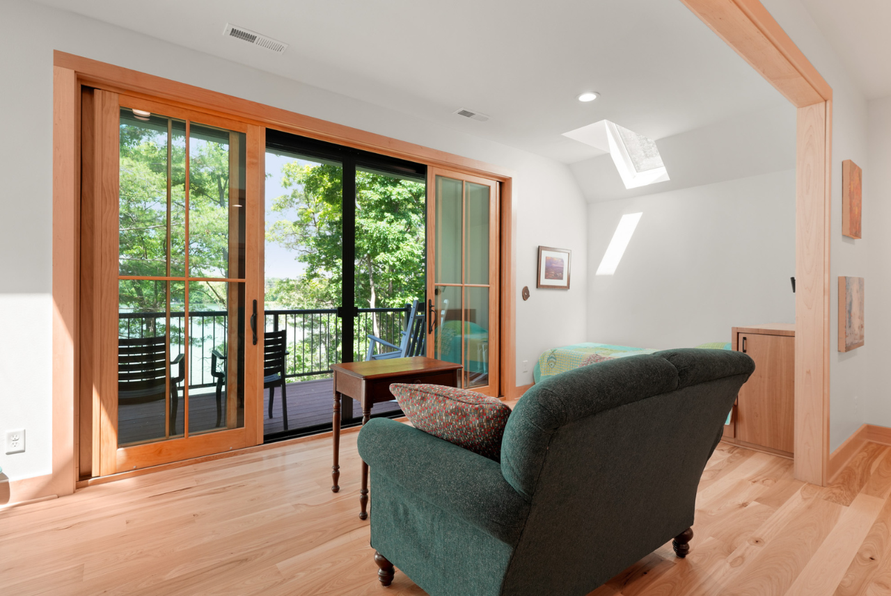 A cozy reading nook with a view, created by home builders in Waukesha, WI, perfect for relaxation and enjoying natural light.