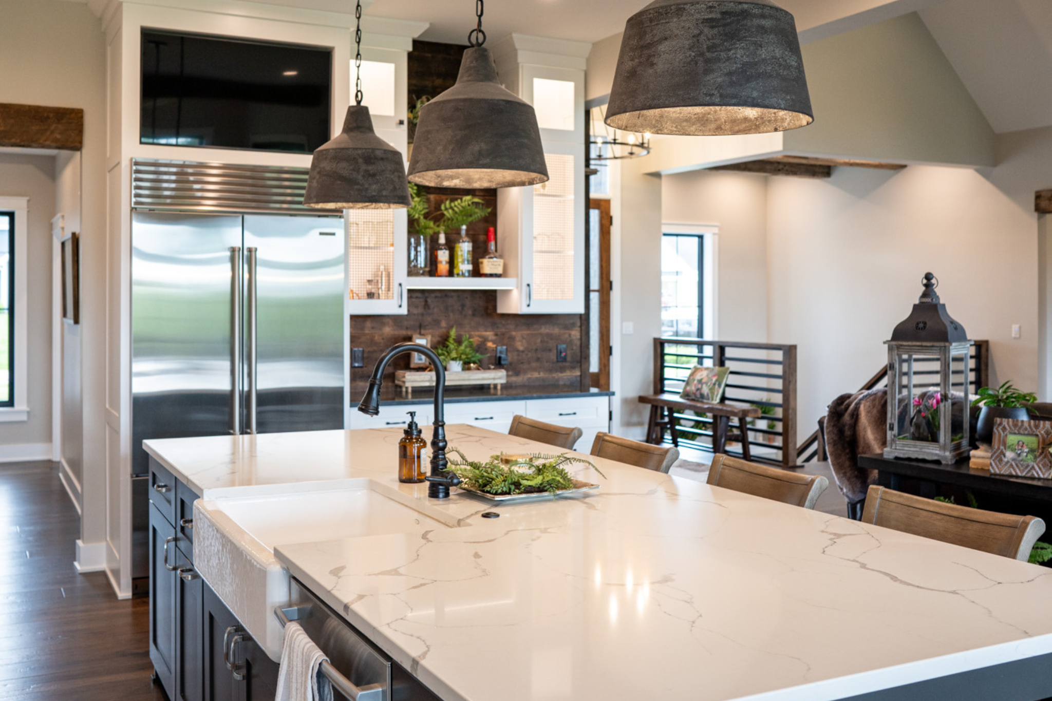 Cost to build a home in Wisconsin includes modern kitchen designs with high-end appliances and stylish lighting fixtures.